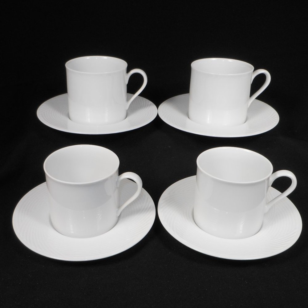 4 sets of tea cups & saucers. DANSK JACK LENOR LARSEN